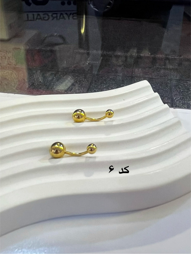پیرسینگ جواهری ناف | نگین مخراج کاری شده | ضد زنگ | استیل رنگ ثابت | کیفیت درجه ۱ | ضد حساسیت
