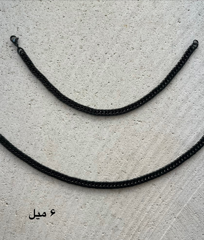 ست گردنبند و دستبند مردانه کارتیر تراش مشکی استیل رنگ ثابت
